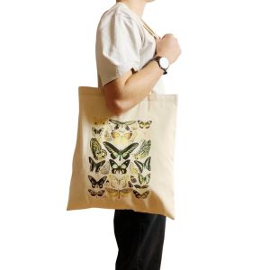 Adolphe Millot butterfly botanical tote bag modelled over the shoulder