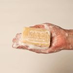 Bee Cosmetics English lavender soap being used to wash hands