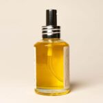 Close-up of the pump dispenser on the Bee Cosmetics jojoba cleansing oil bottle
